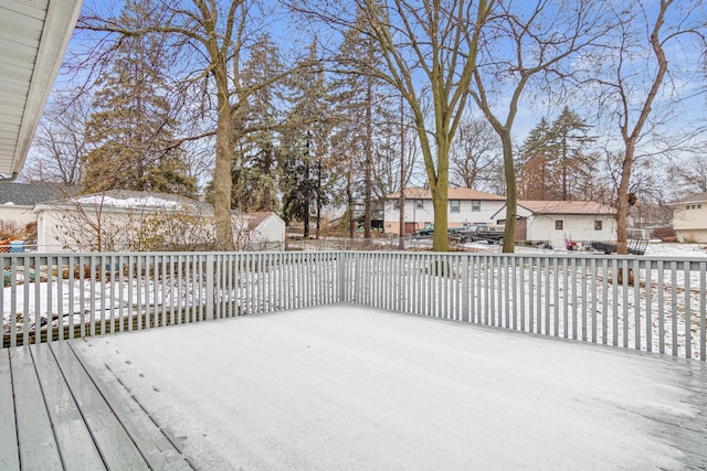 view of snow covered deck