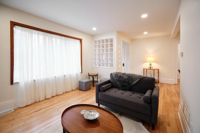 sitting room with light wood-type flooring