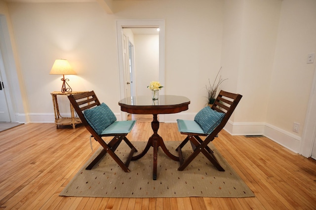 sitting room featuring hardwood / wood-style flooring