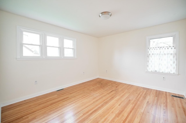 empty room featuring light hardwood / wood-style floors