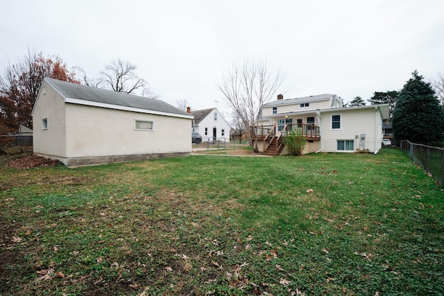 view of yard featuring a wooden deck