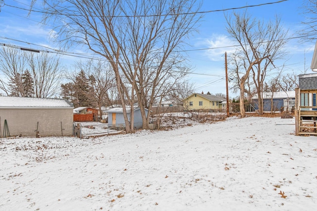 view of yard covered in snow