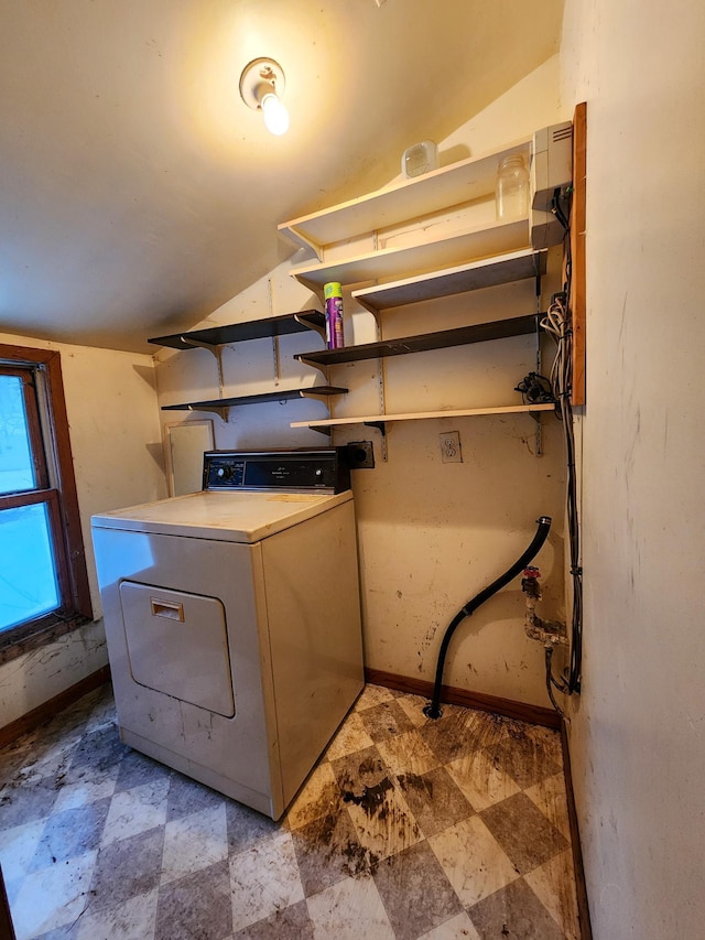 laundry room with washer / dryer