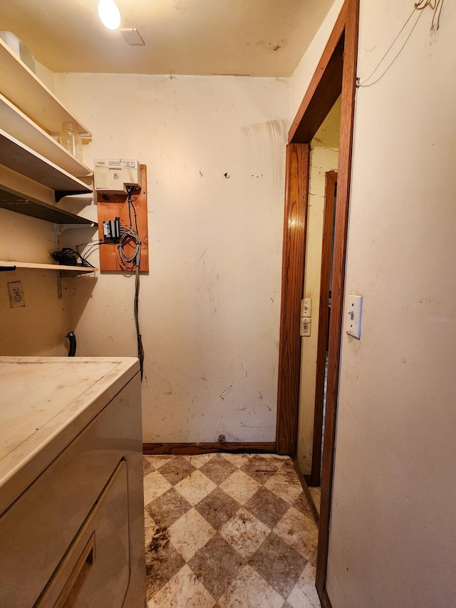 clothes washing area featuring washer / dryer