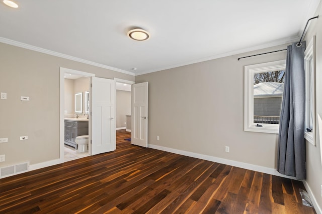 unfurnished bedroom featuring ornamental molding, dark wood finished floors, visible vents, and baseboards