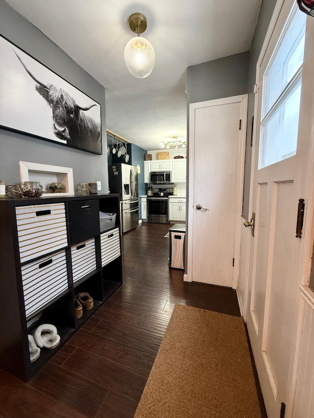 hall featuring dark wood-type flooring