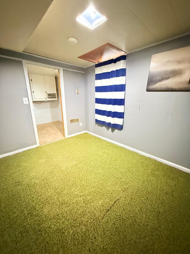 unfurnished room featuring baseboards and light carpet