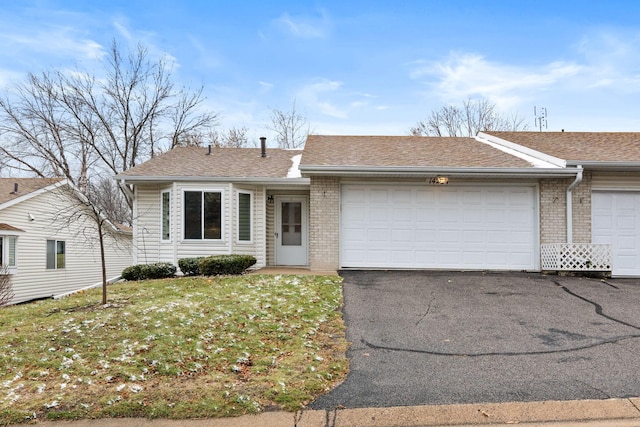 single story home with a garage