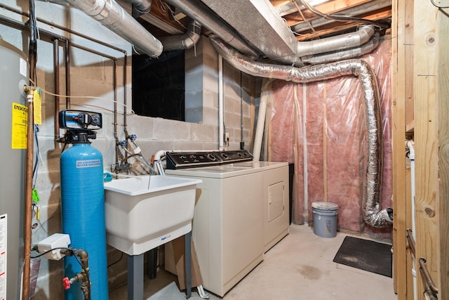 laundry area with sink and washer and dryer