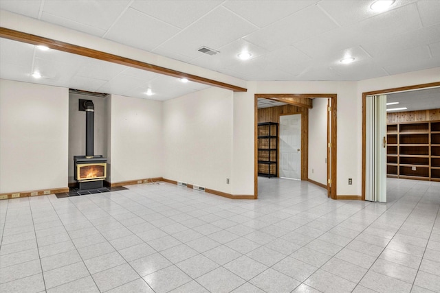 basement featuring a wood stove