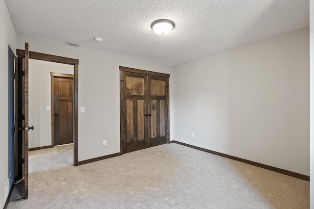 unfurnished bedroom featuring a textured ceiling