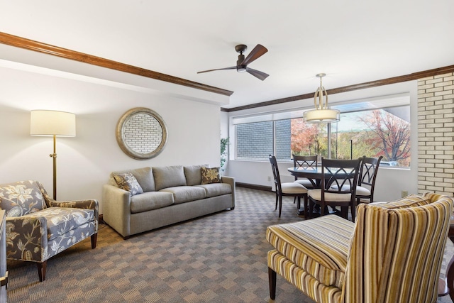 carpeted living room featuring ceiling fan and crown molding