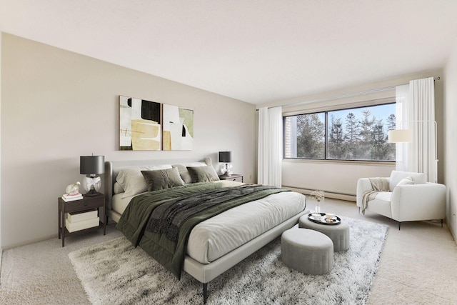 carpeted bedroom with a baseboard radiator