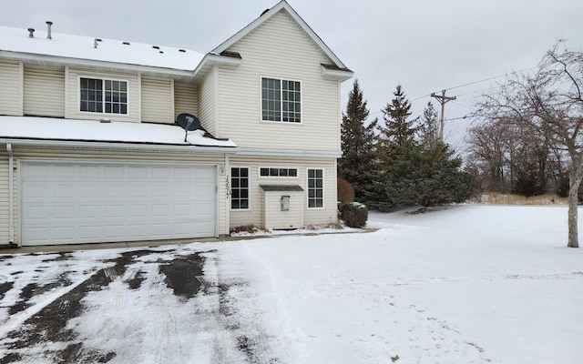 front of property featuring a garage