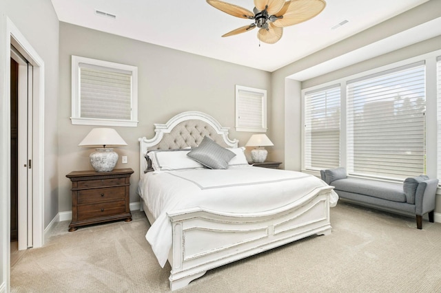 carpeted bedroom featuring ceiling fan