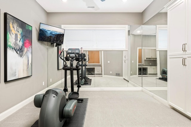 workout area with light colored carpet