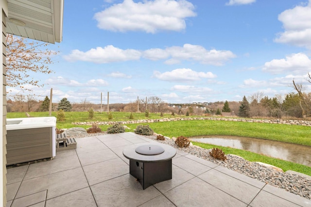 view of patio featuring a fire pit