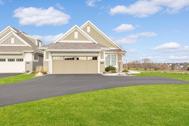 craftsman-style house with a front yard