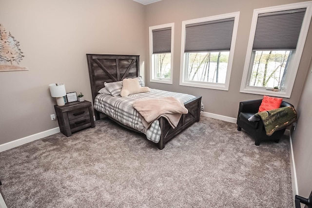 bedroom featuring light carpet