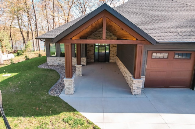 exterior space with a garage, concrete driveway, and an attached carport