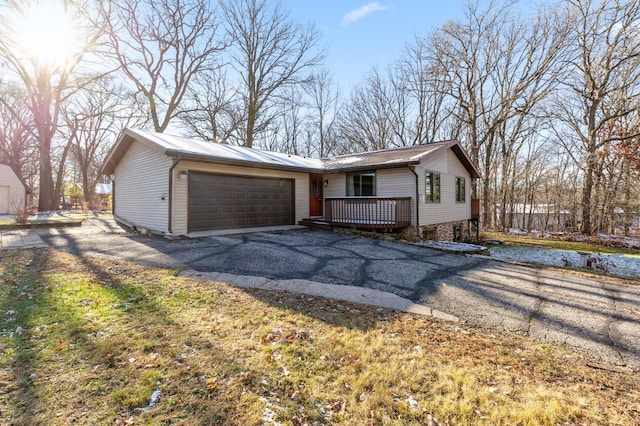 ranch-style home featuring a garage