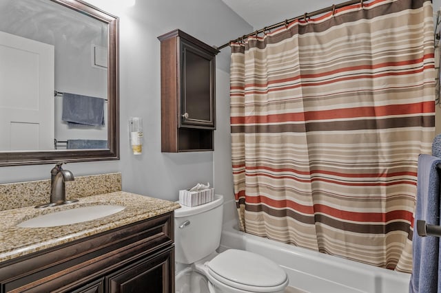 full bathroom featuring vanity, shower / bathtub combination with curtain, and toilet