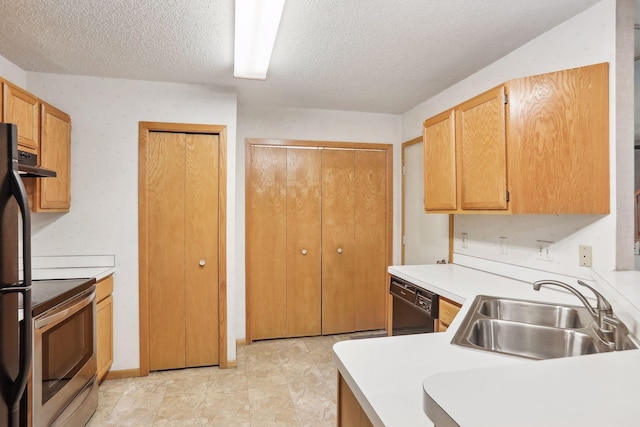 kitchen featuring a textured ceiling, sink, electric stove, black dishwasher, and stainless steel refrigerator