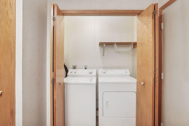 laundry area featuring independent washer and dryer