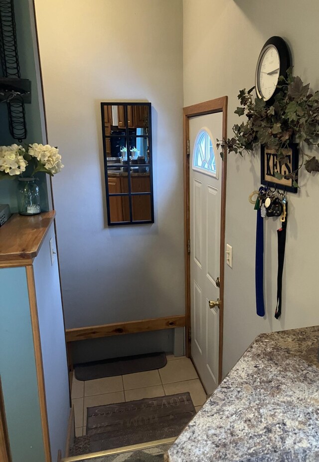 entryway featuring tile patterned flooring