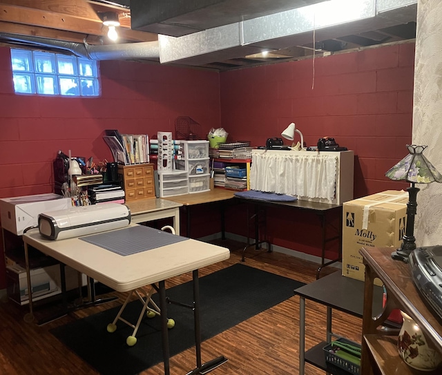 office with dark hardwood / wood-style flooring