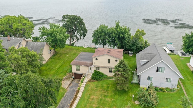 drone / aerial view with a water view