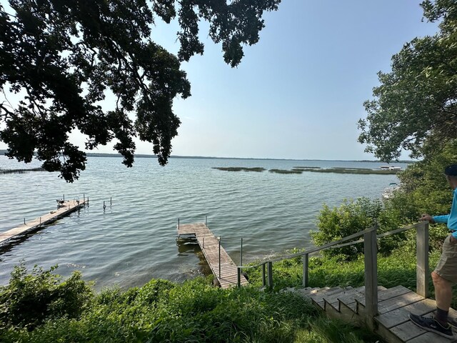 view of dock with a water view