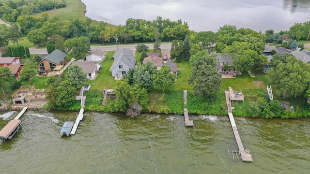 aerial view featuring a water view and a residential view