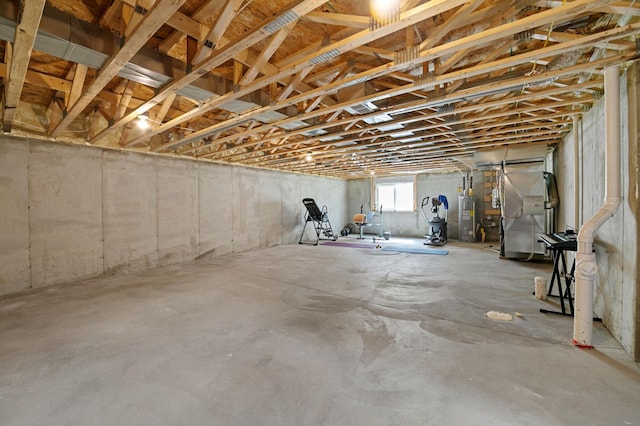 basement featuring heating unit and water heater