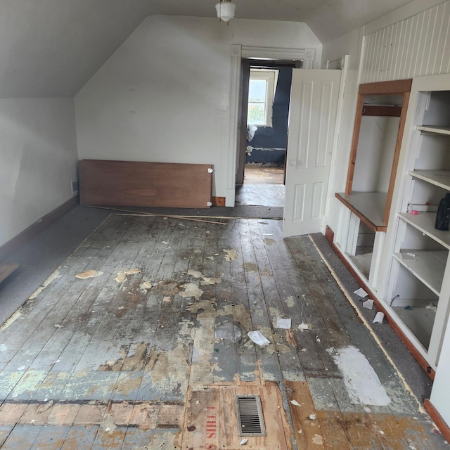 bonus room with vaulted ceiling