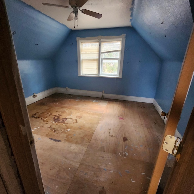 bonus room featuring ceiling fan and lofted ceiling