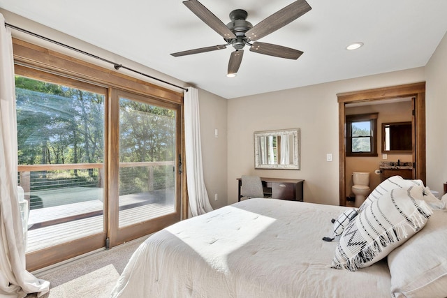 bedroom with ensuite bath, ceiling fan, access to outside, and carpet flooring