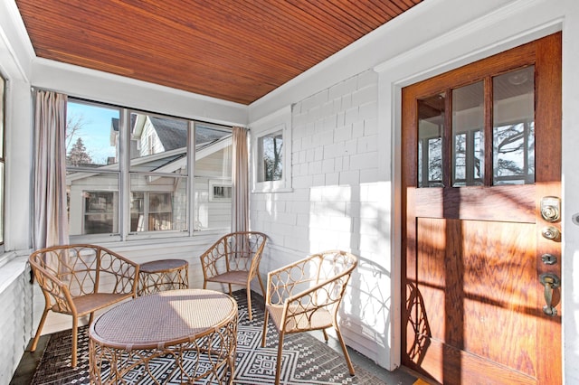 sunroom / solarium with wood ceiling