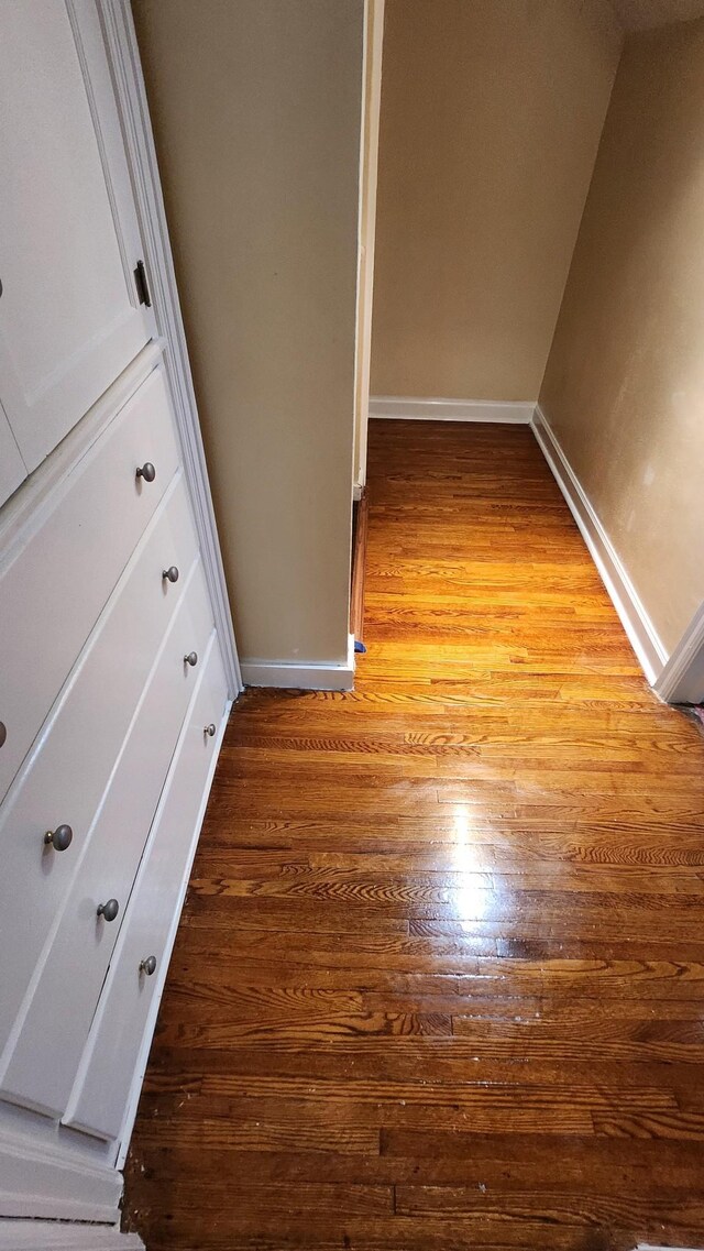 hallway featuring hardwood / wood-style floors