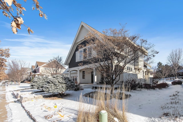 view of snow covered property