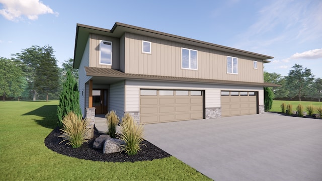 view of front of home featuring a garage and a front lawn