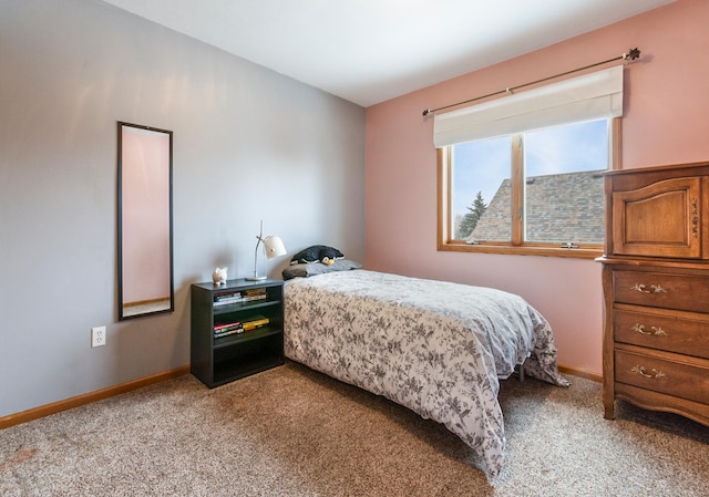 bedroom with light carpet