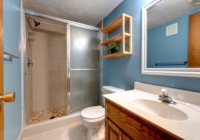 bathroom with walk in shower, toilet, and a textured ceiling