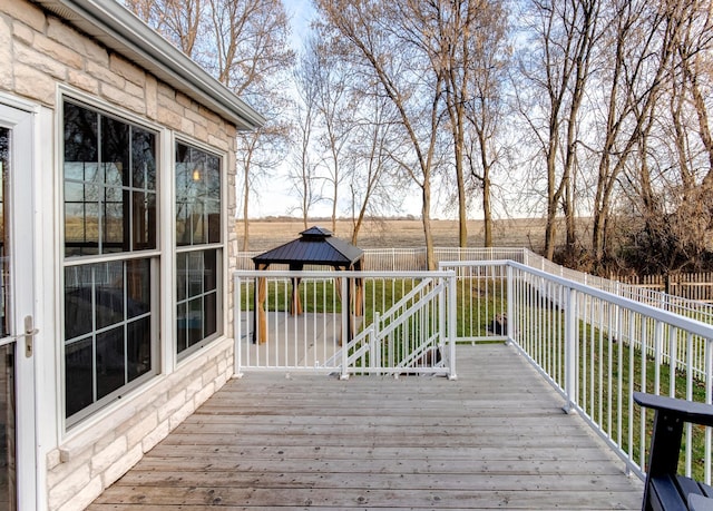 wooden deck featuring a gazebo