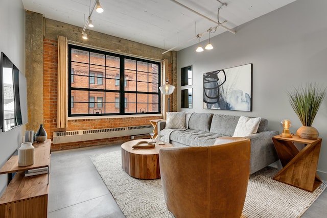 living room with concrete flooring and radiator