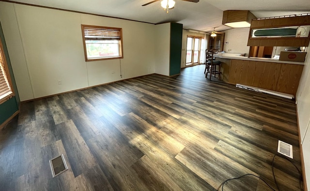 unfurnished living room featuring a baseboard heating unit, dark hardwood / wood-style floors, ceiling fan, and lofted ceiling