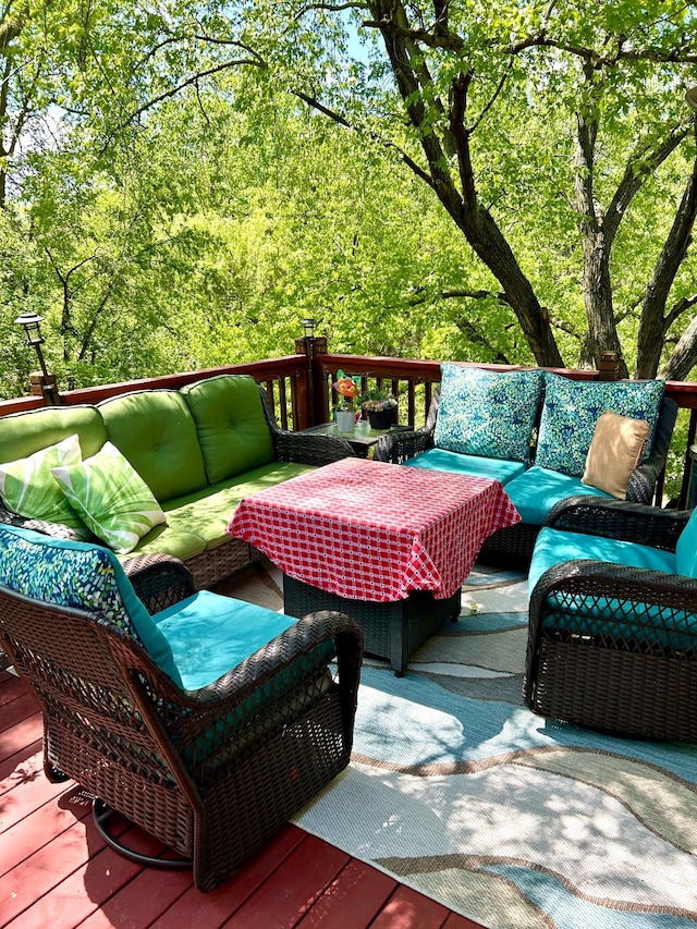 wooden deck featuring an outdoor living space