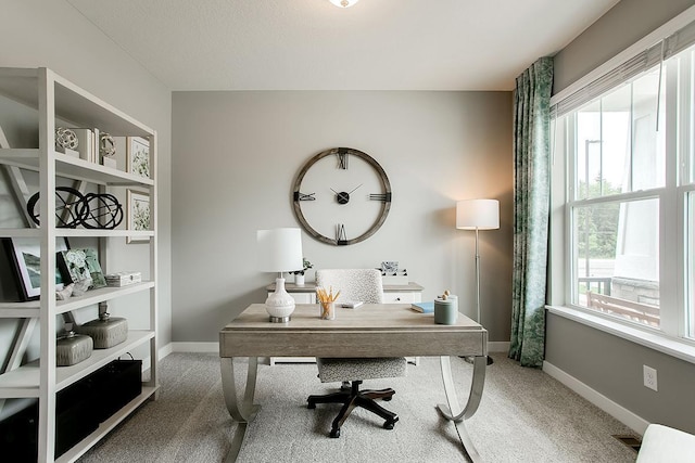 view of carpeted home office