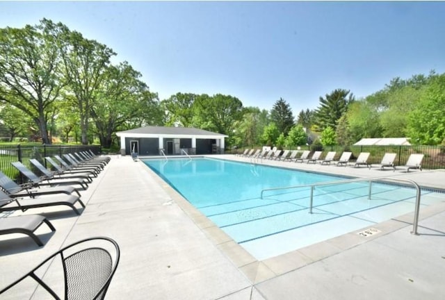 view of pool featuring a patio