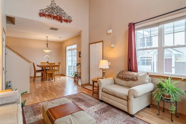 living room with light hardwood / wood-style floors